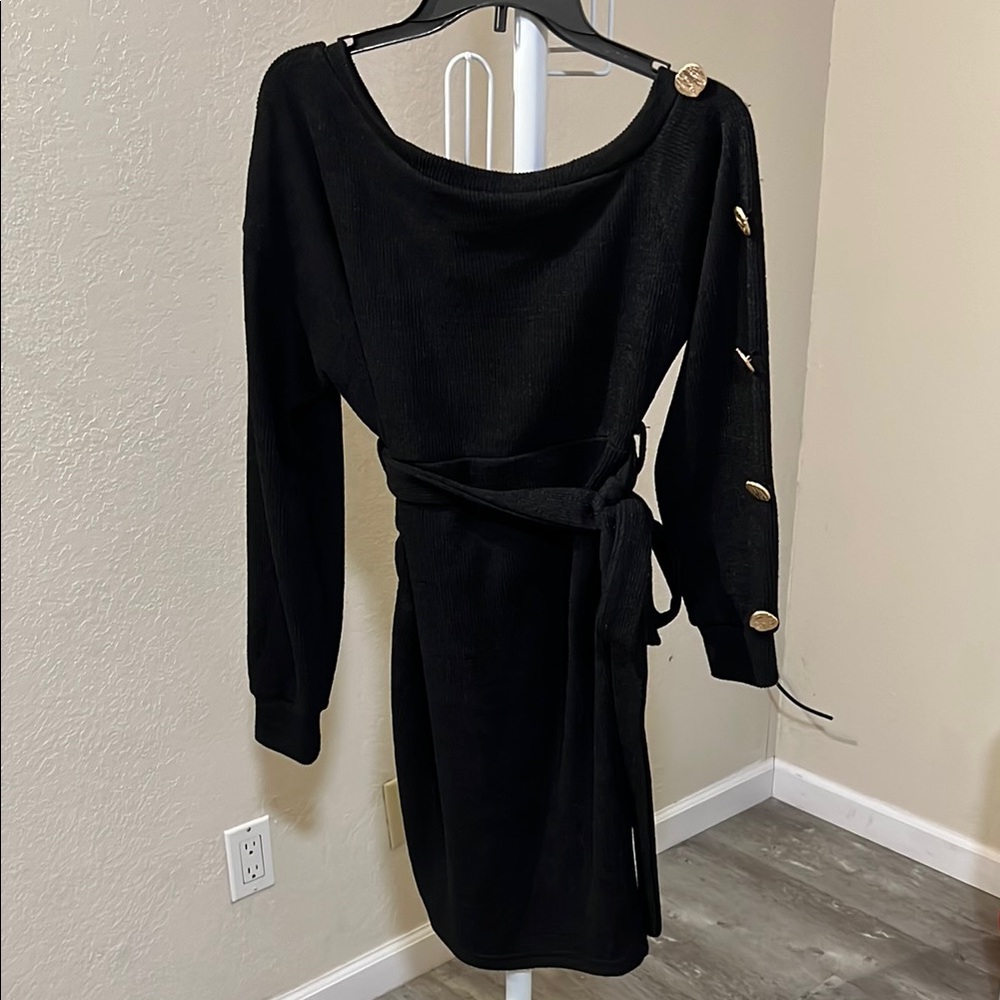 Elegant Black Dress with Gold Button Accents